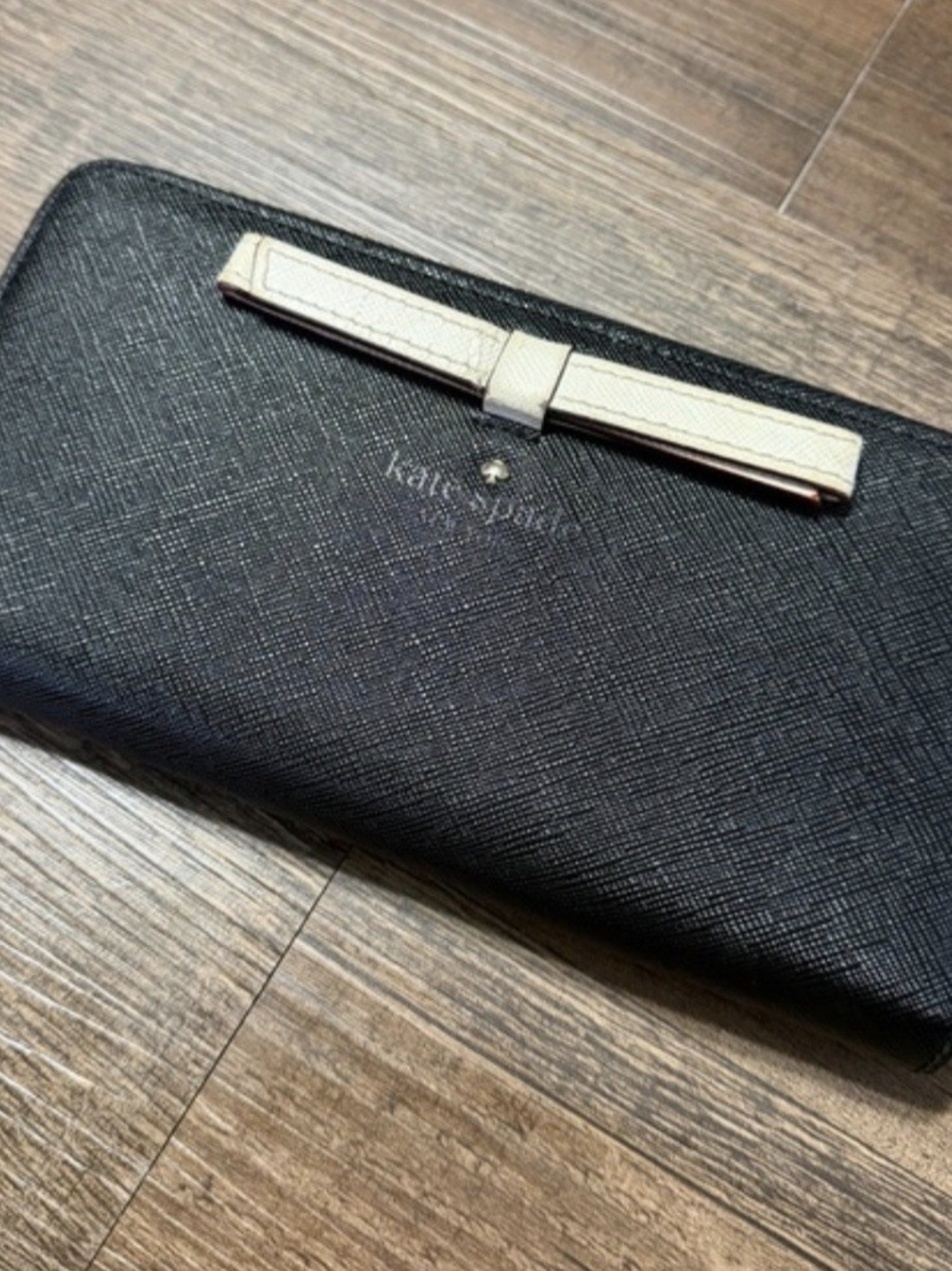 kate spade black wallet with cream bow detail